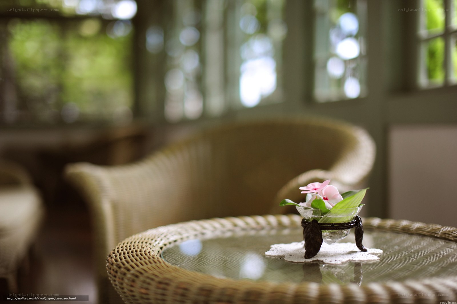 Wicker table with flower arrangement