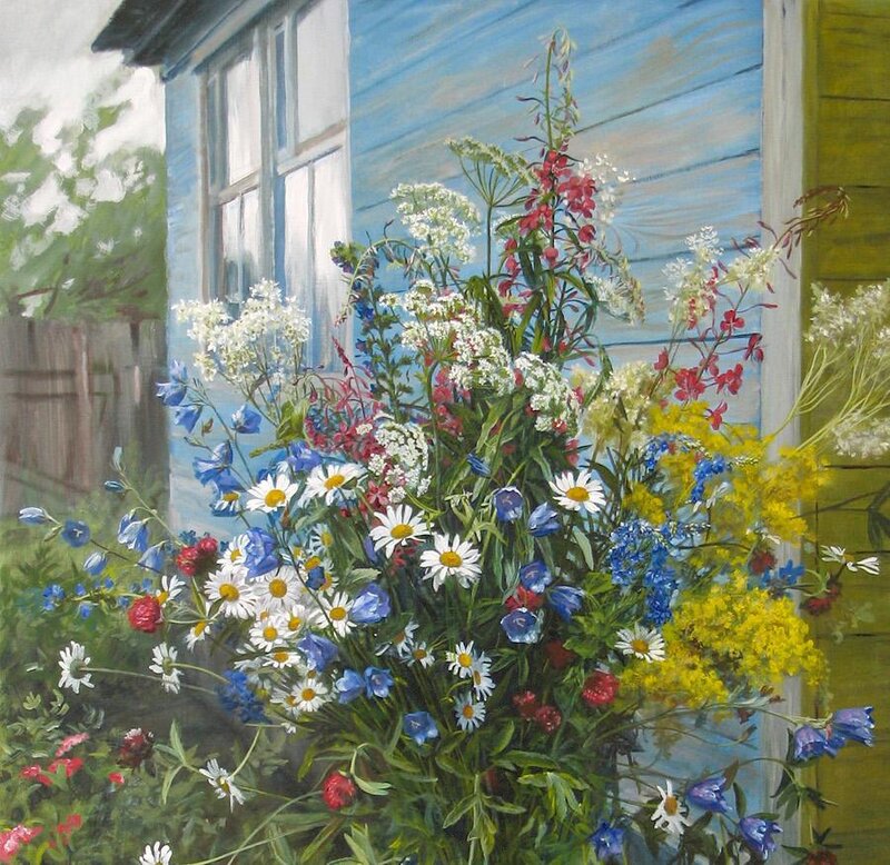 Wildflowers by a blue house