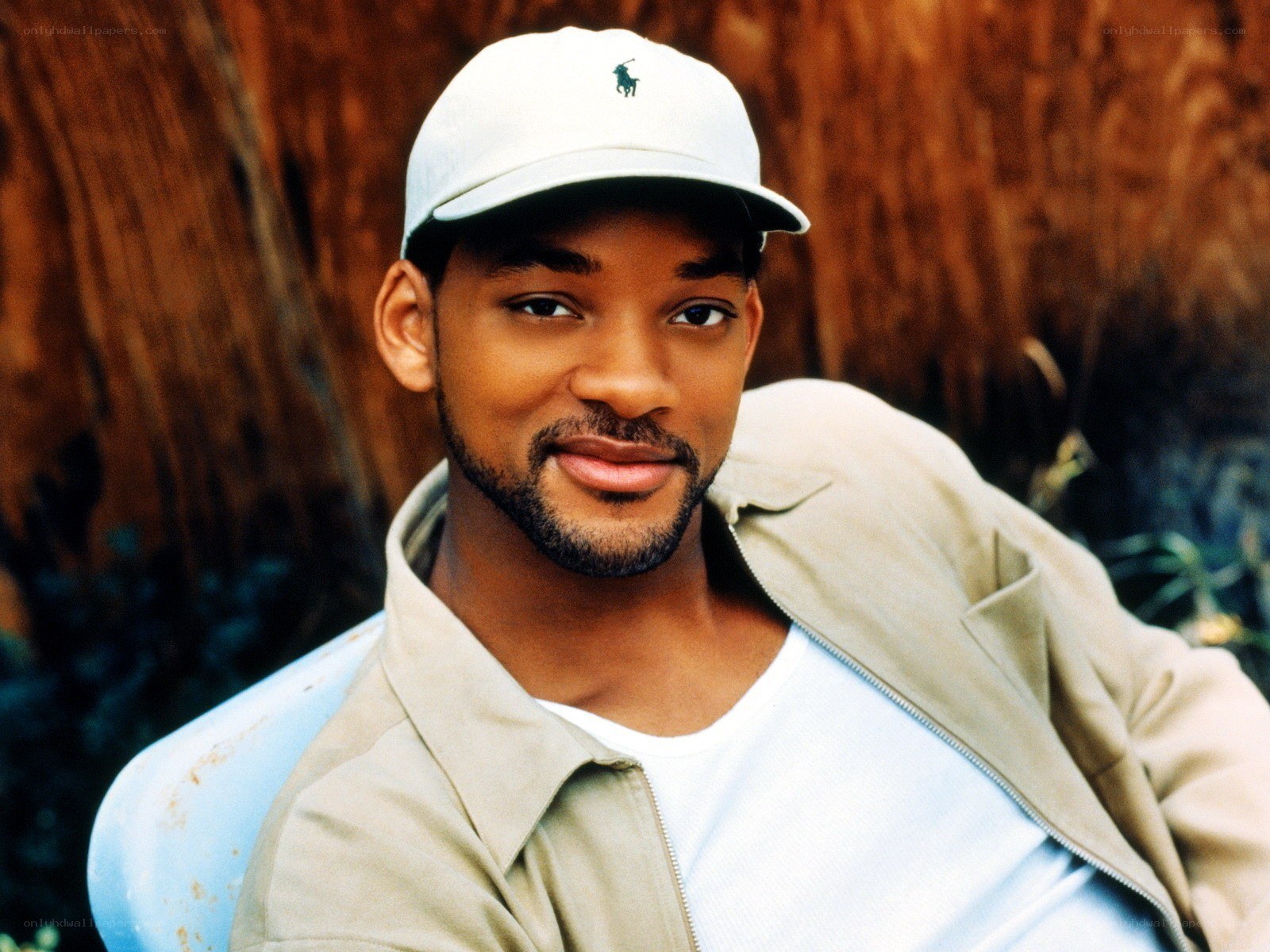 Will Smith in cap and jacket