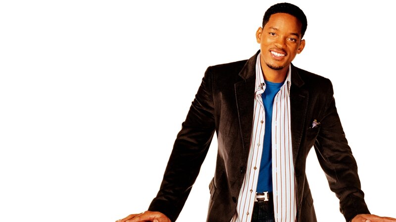 Will Smith smiling in suit