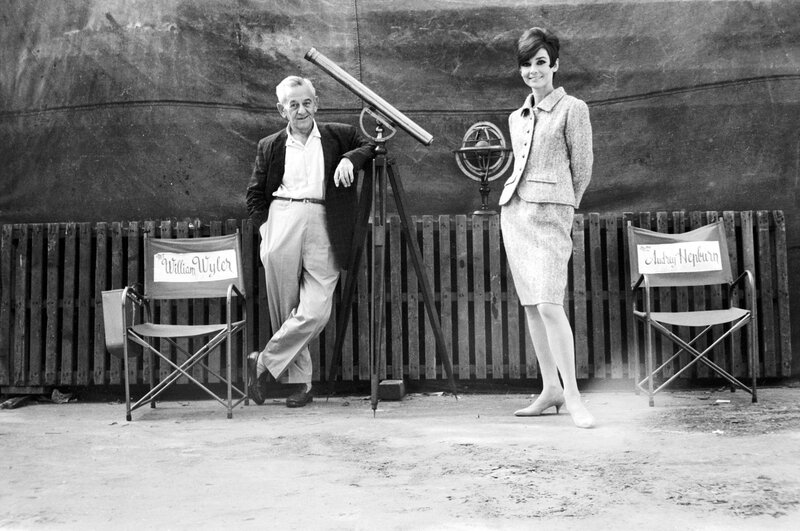 William Wyler and Audrey Hepburn on set
