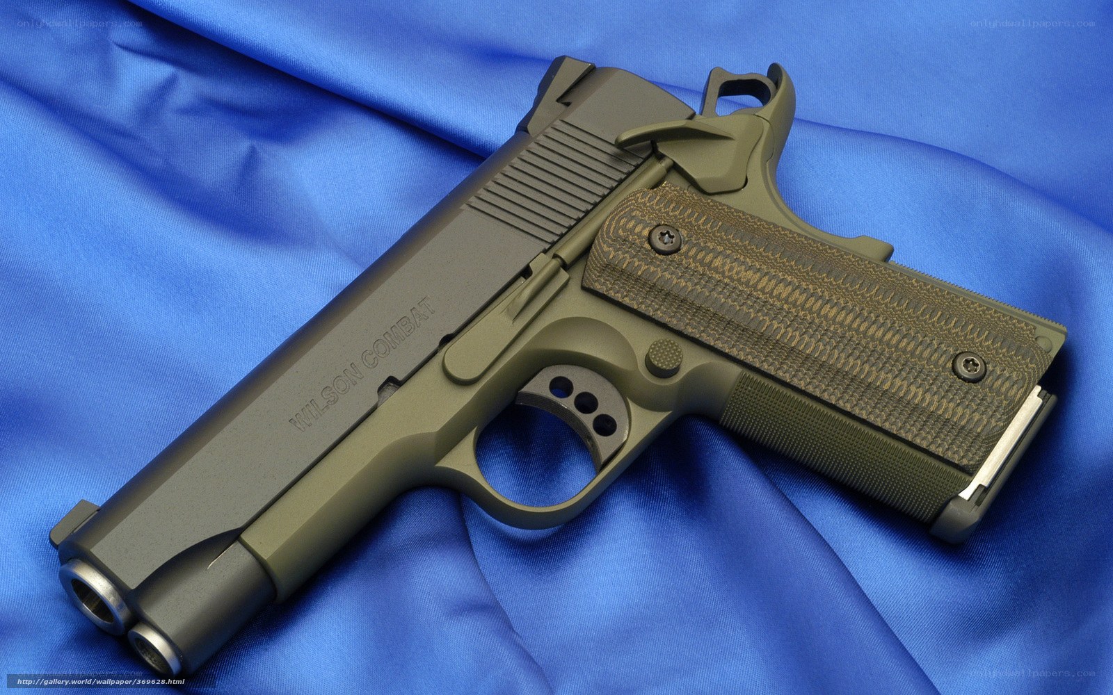 Wilson Combat pistol on blue cloth