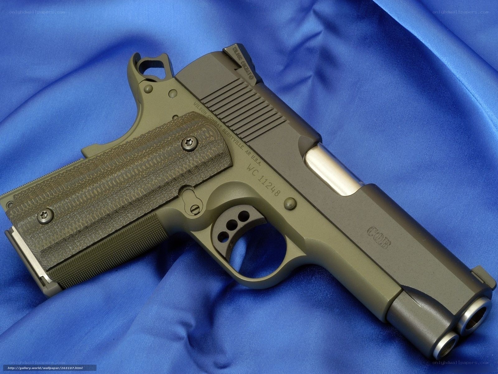Wilson Combat pistol on blue cloth