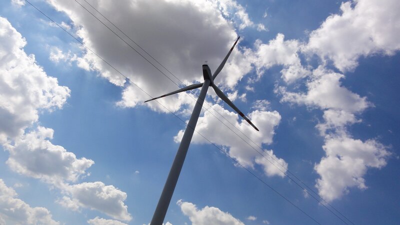 Wind Turbine Against Sky — Blue, Serene, Afternoon