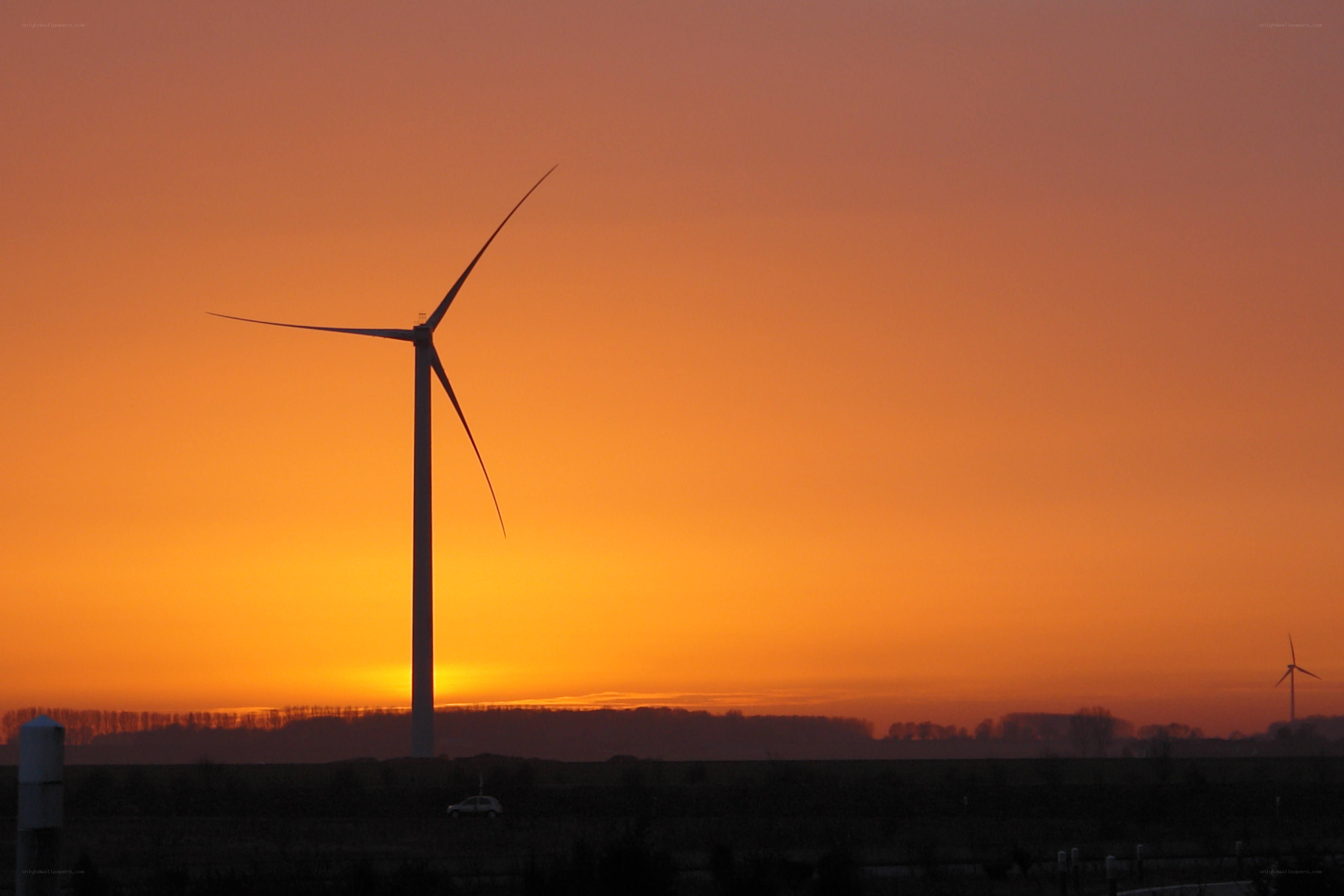 Wind turbine at sunset