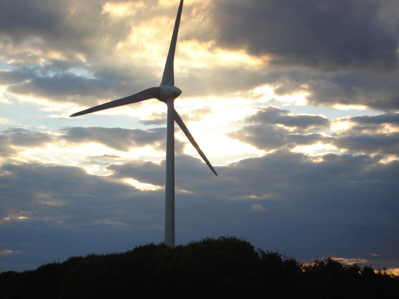 Wind turbine at sunset