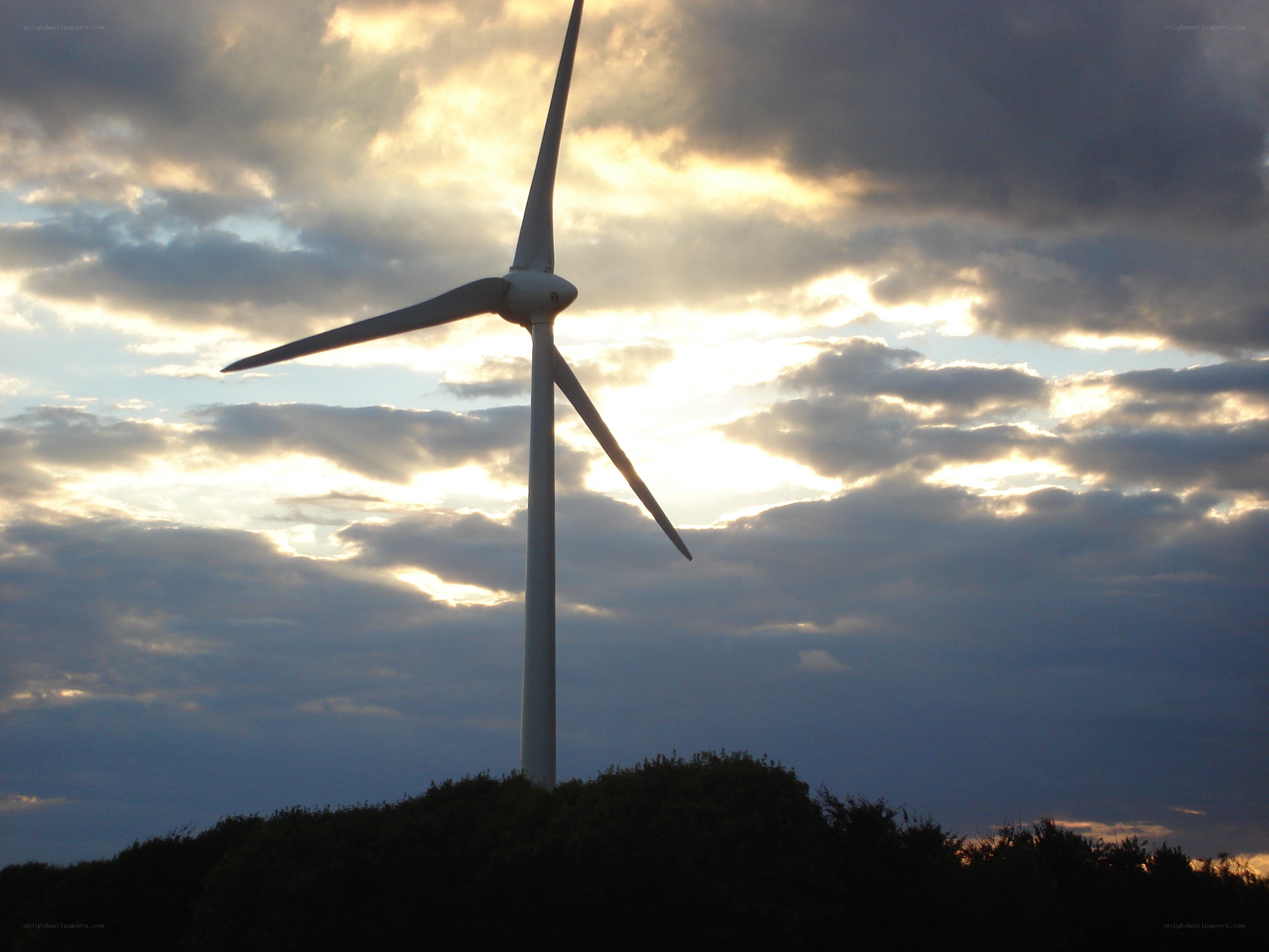 Wind turbine at sunset