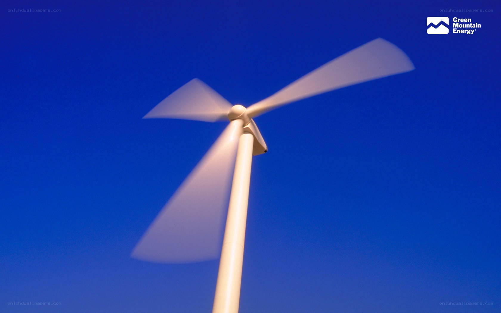 Wind turbine in blue sky