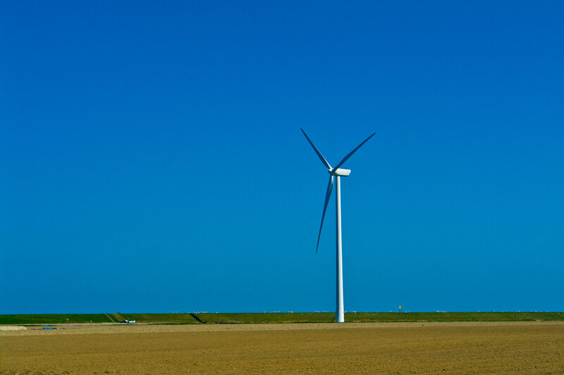 Wind turbine in open field