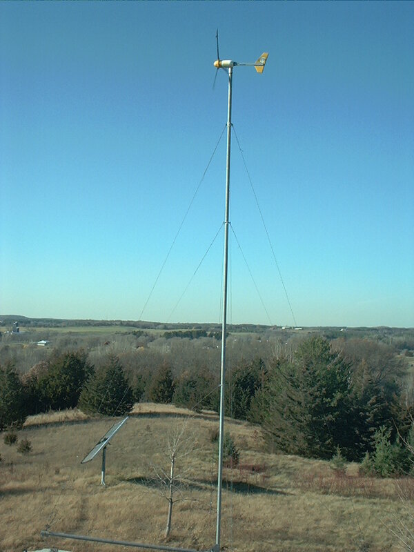 Wind turbine on a hill