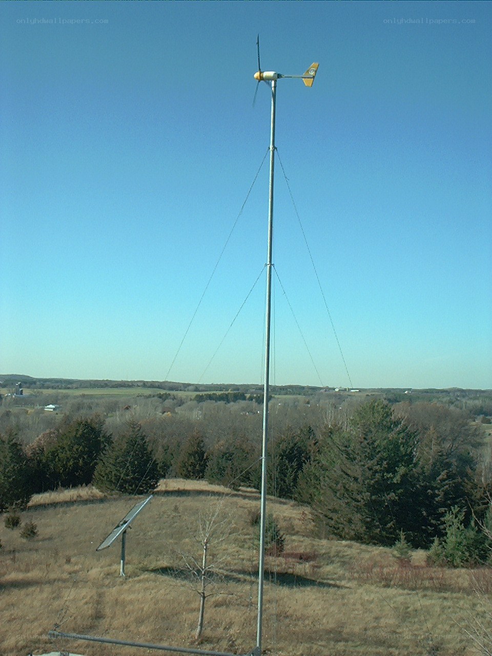 Wind turbine on a hill