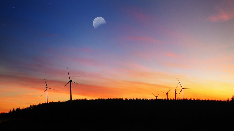 Wind Turbines at Dusk — Orange, Serene, Sunset