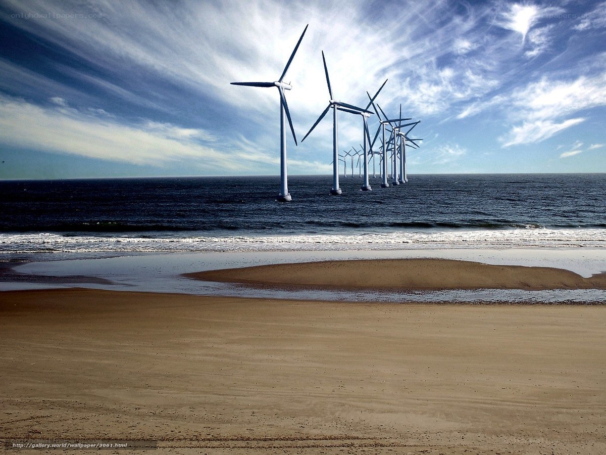 Wind turbines at sea from beach