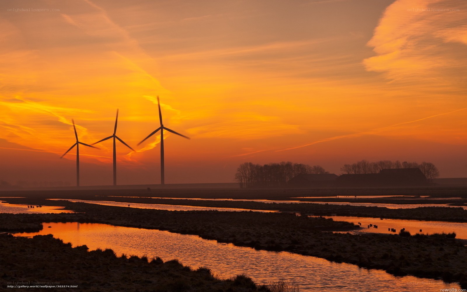 Wind turbines at sunset