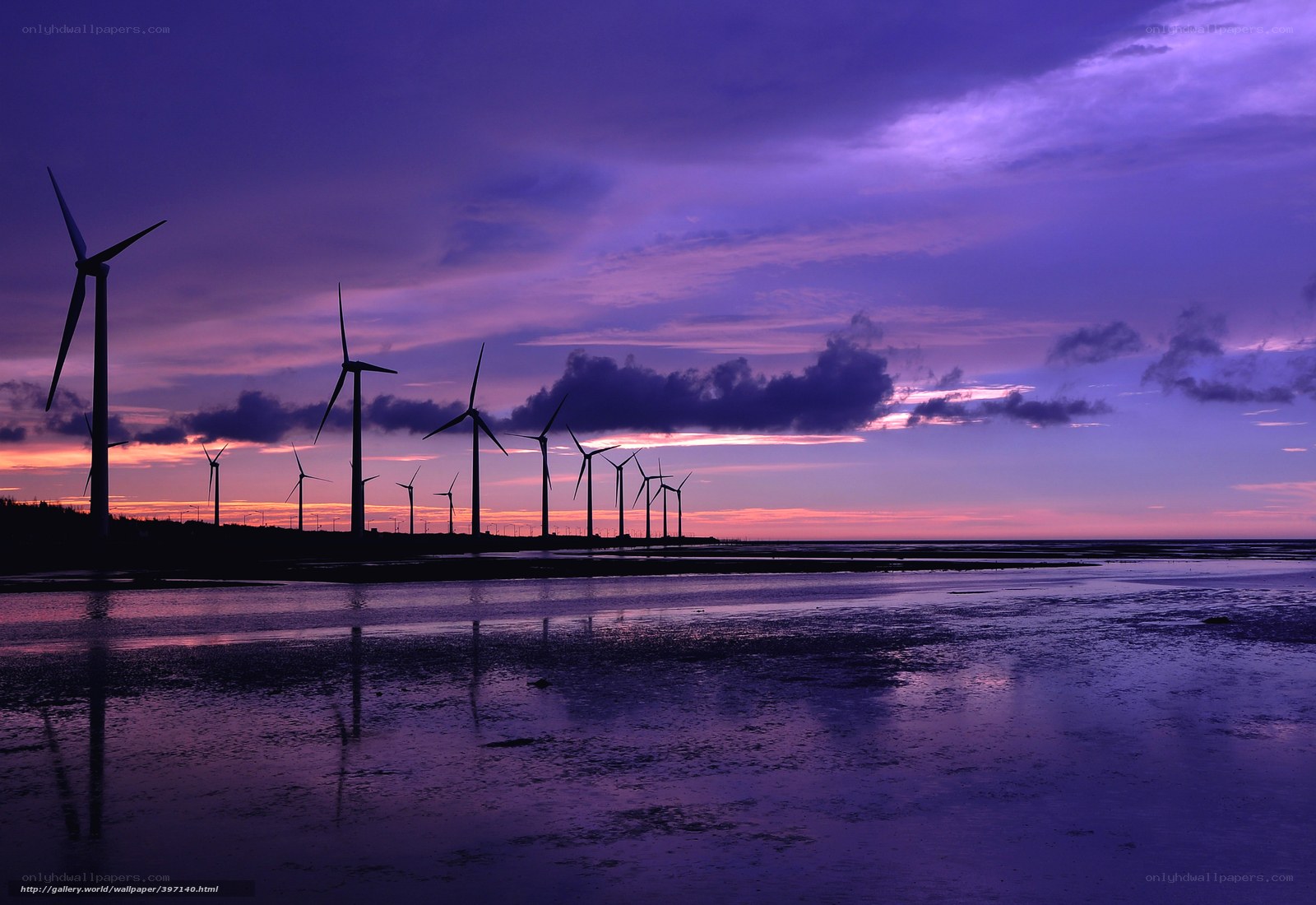 Wind turbines at sunset