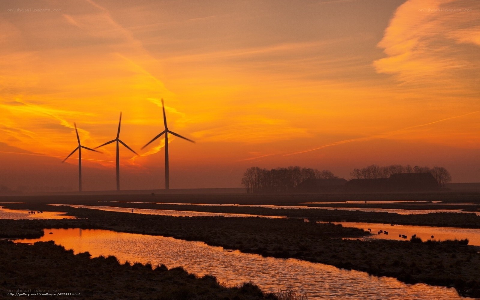Wind turbines at sunset