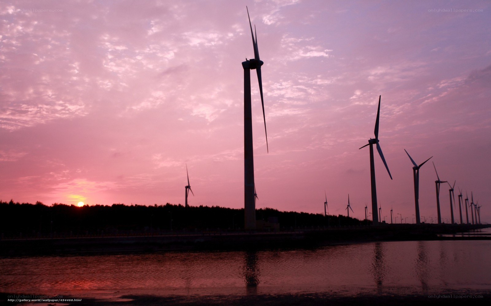 wind turbines at sunset