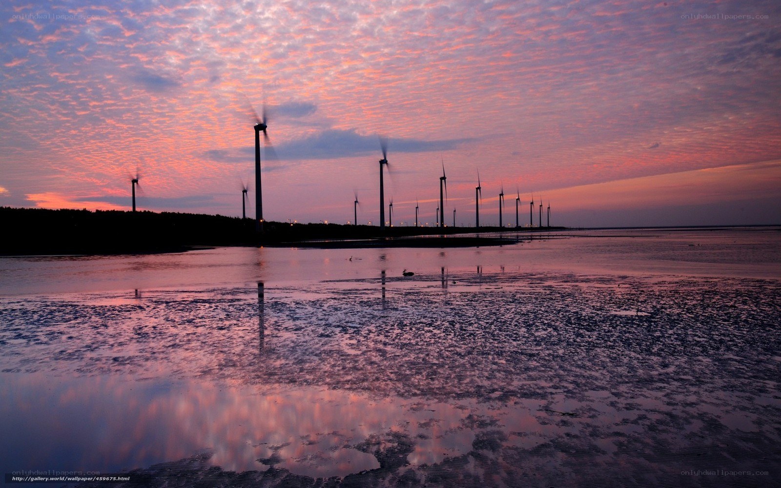 Wind turbines at sunset