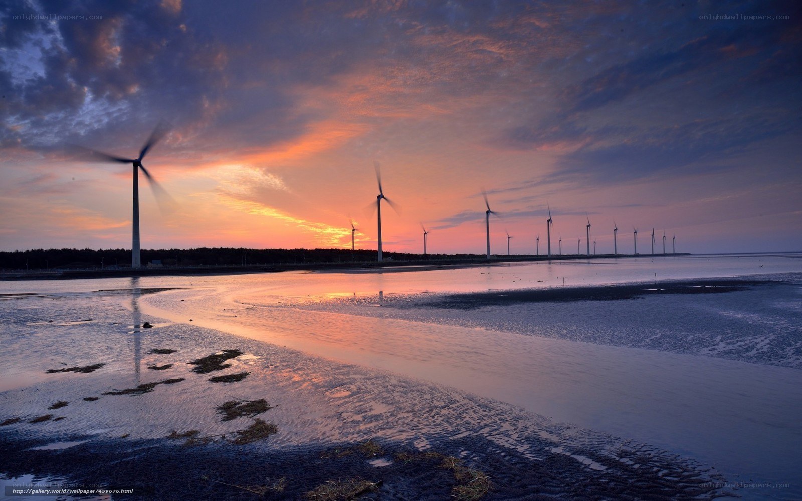 Wind turbines at sunset