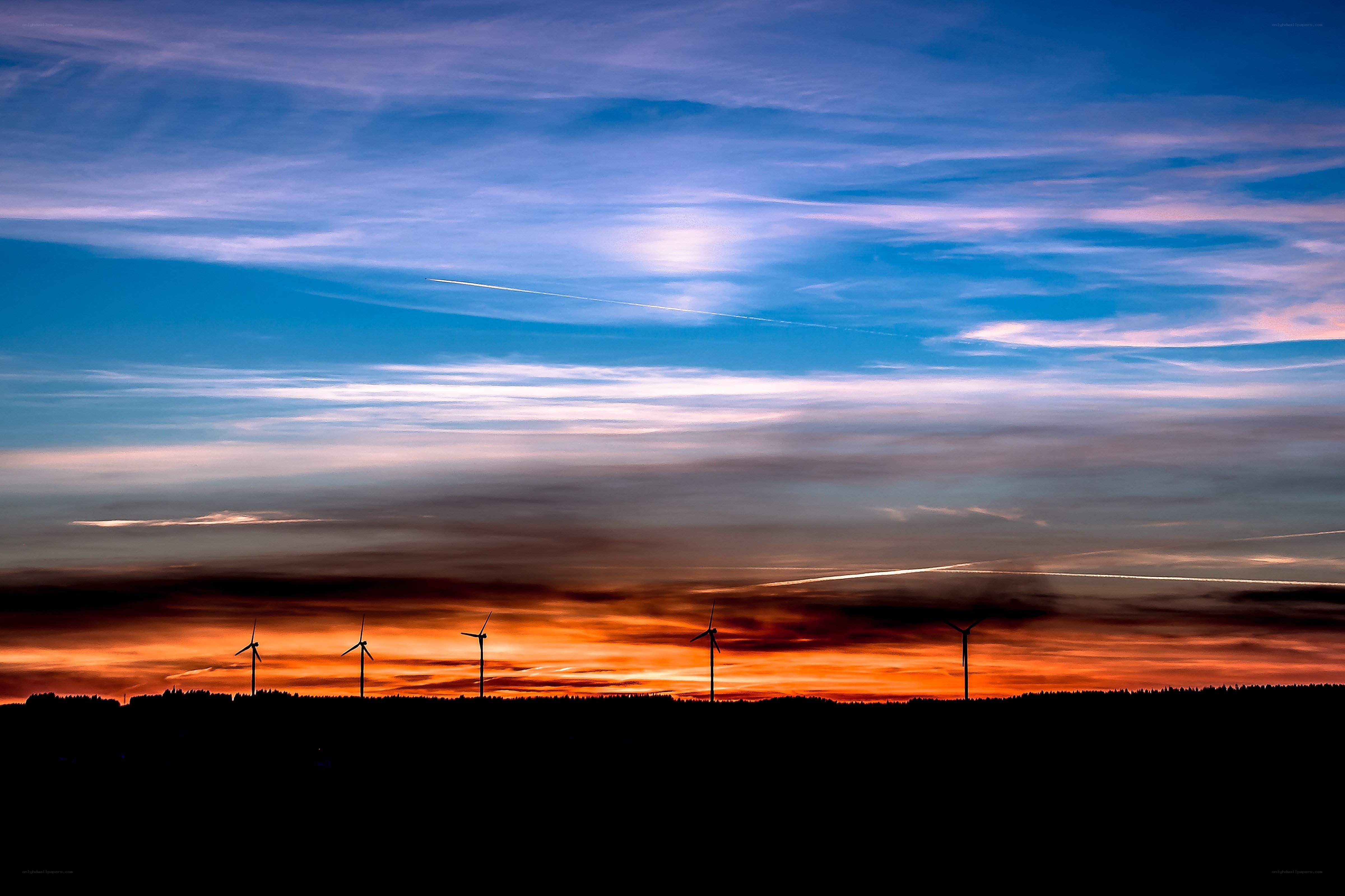 Wind turbines at sunset
