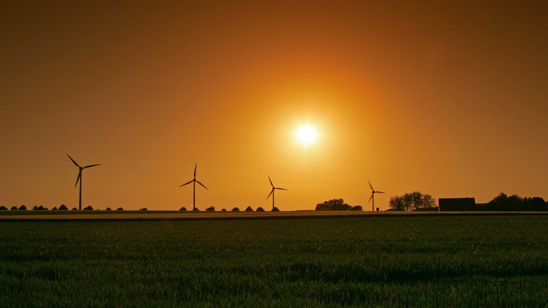 wind turbines at sunset