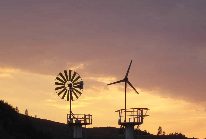 Wind turbines at sunset