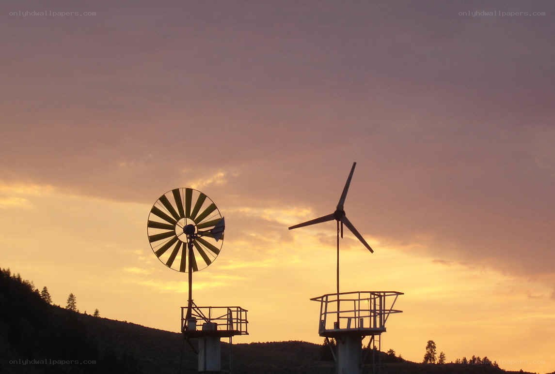 Wind turbines at sunset