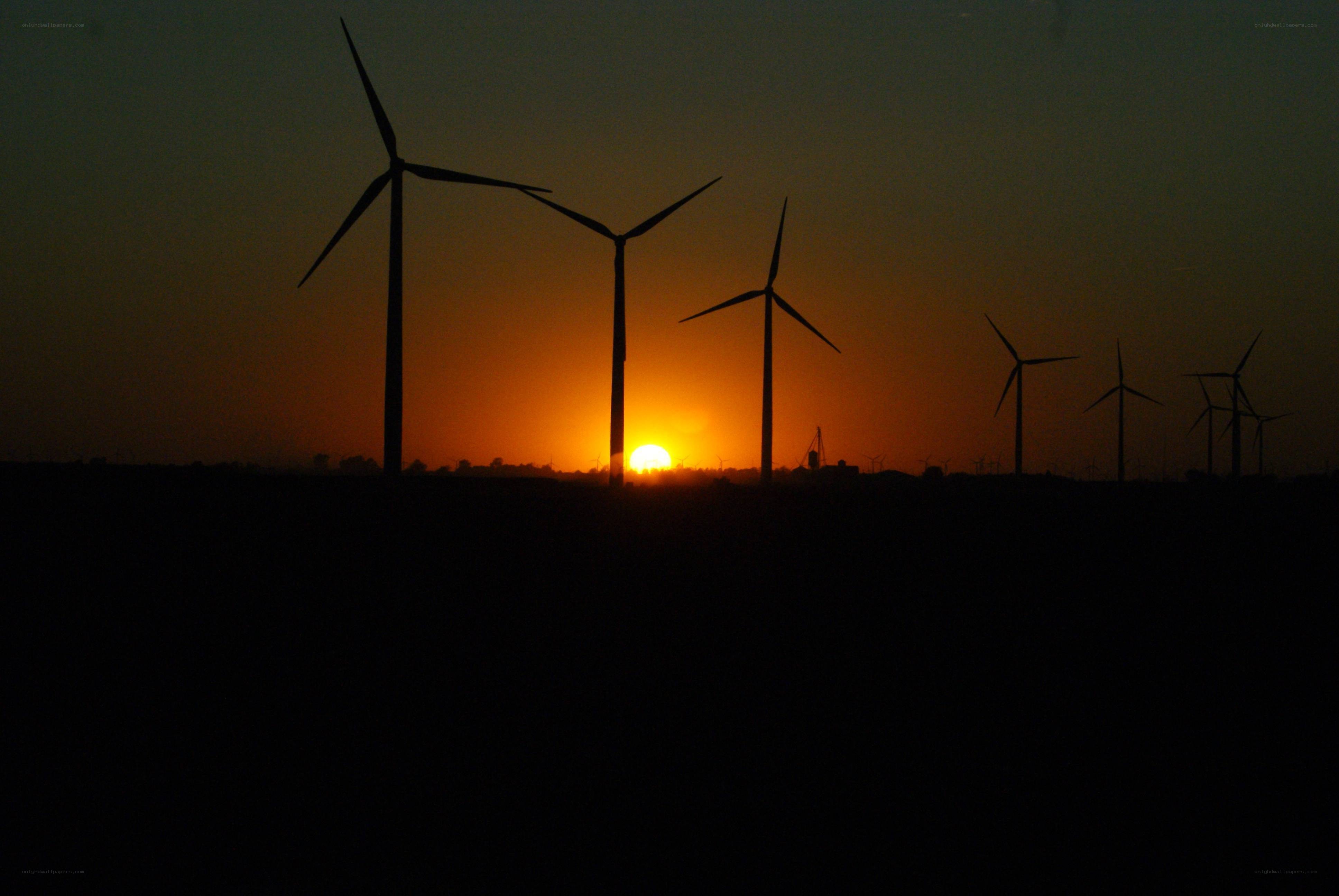 Wind turbines at sunset