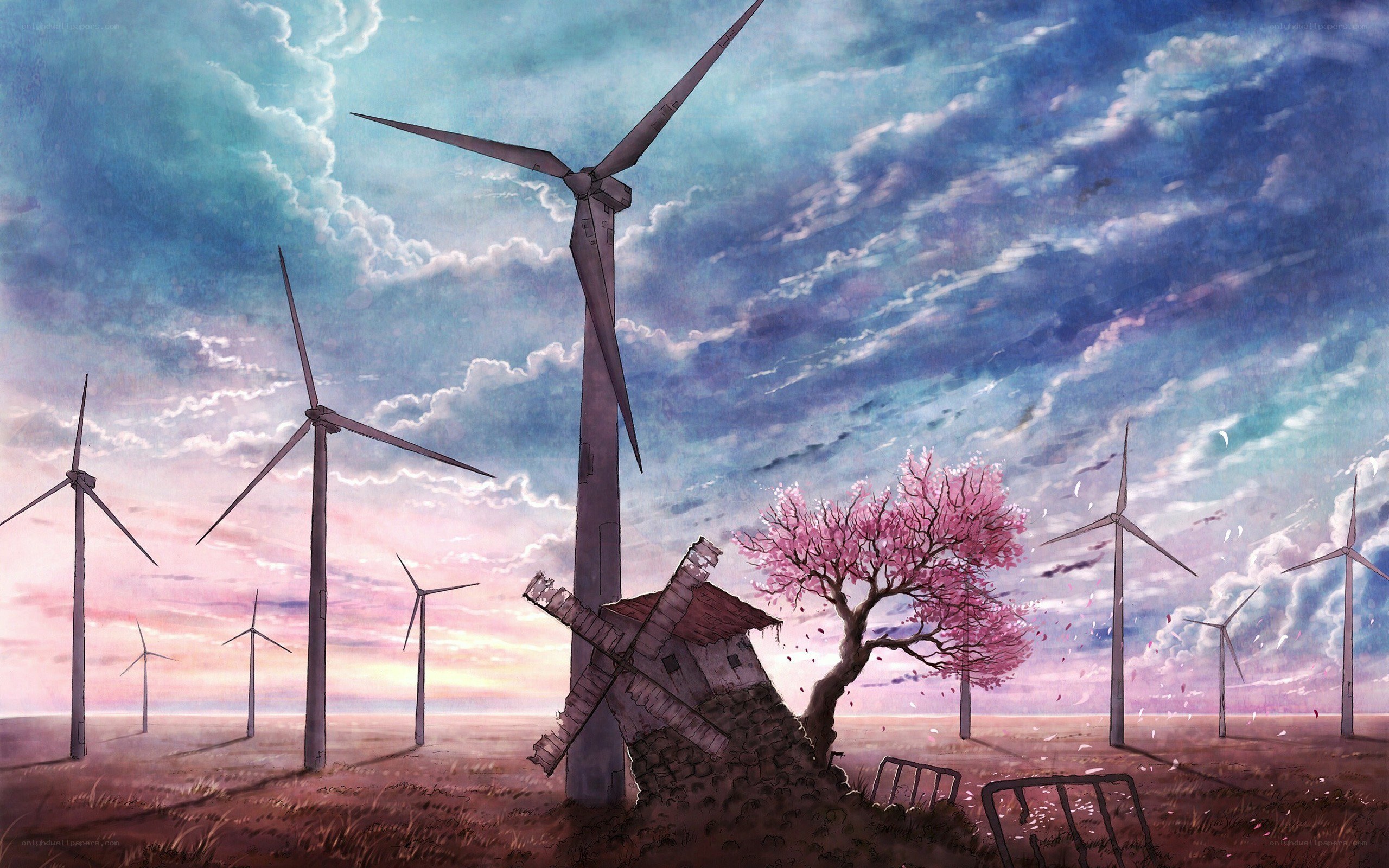 Wind turbines at sunset