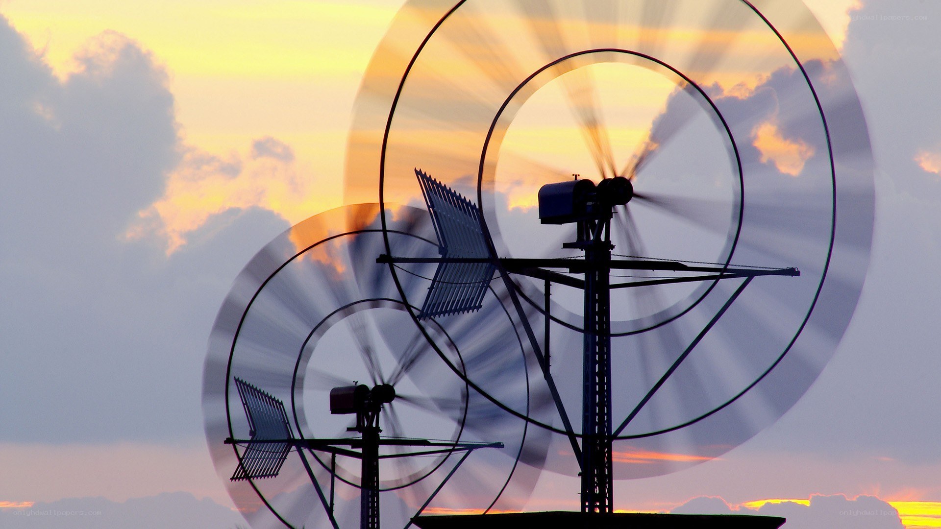 Wind turbines at sunset