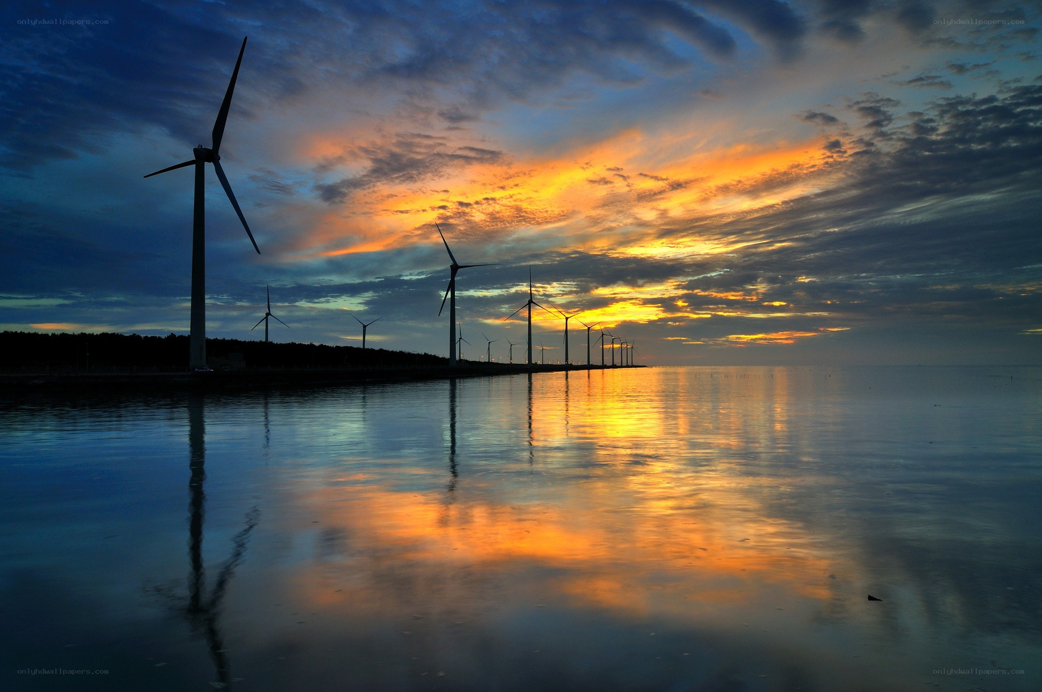 Wind turbines at sunset