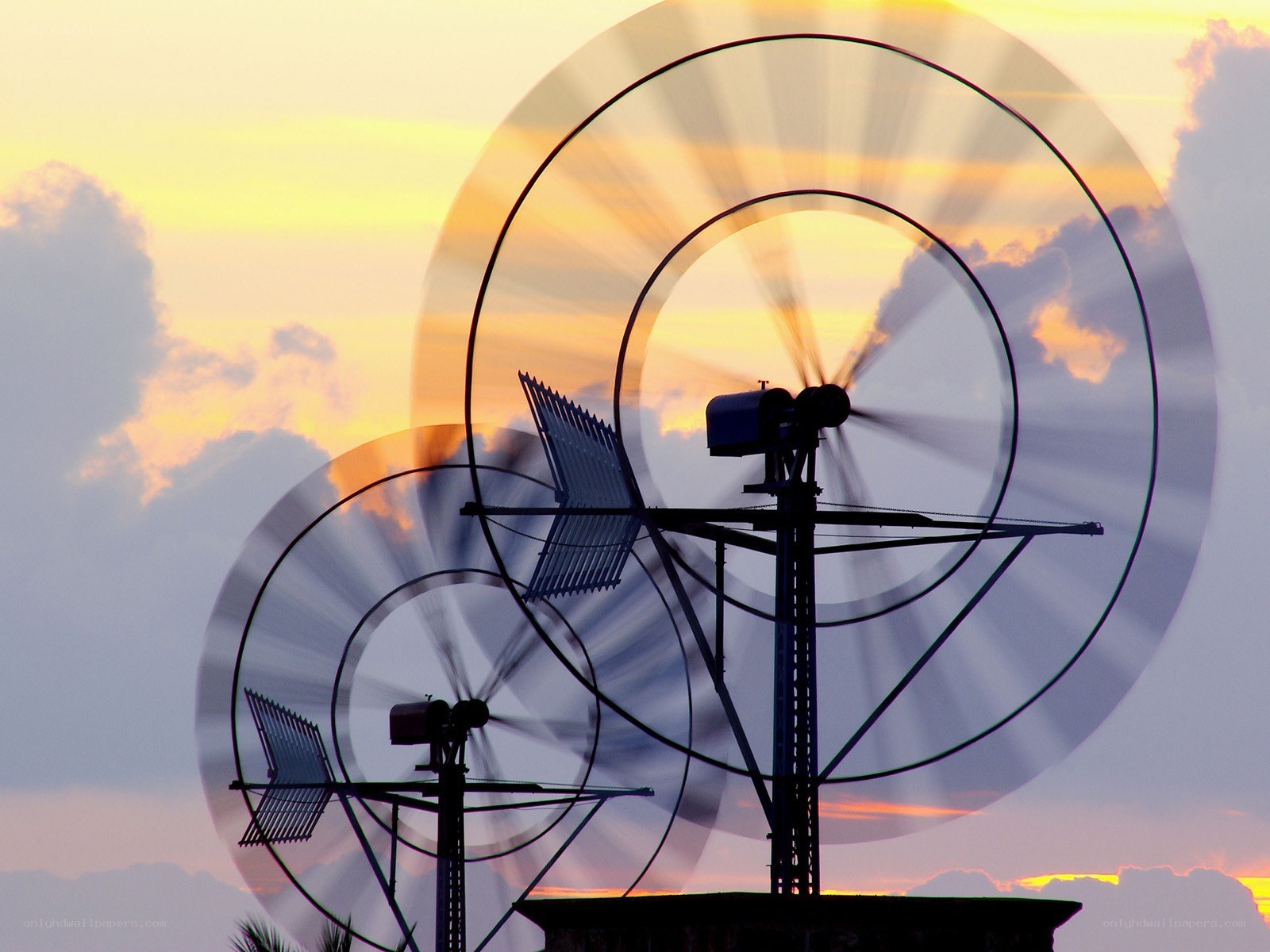 Wind turbines at sunset