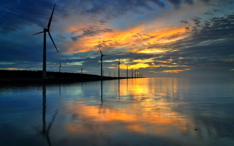 Wind turbines at sunset