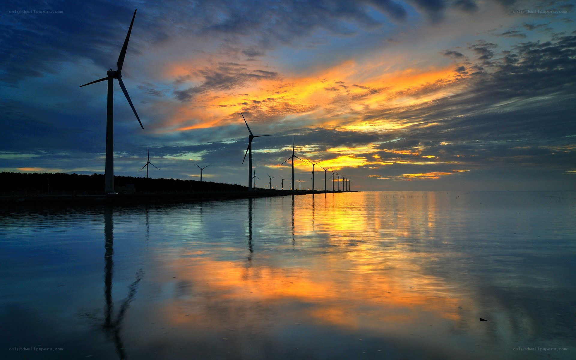 Wind turbines at sunset