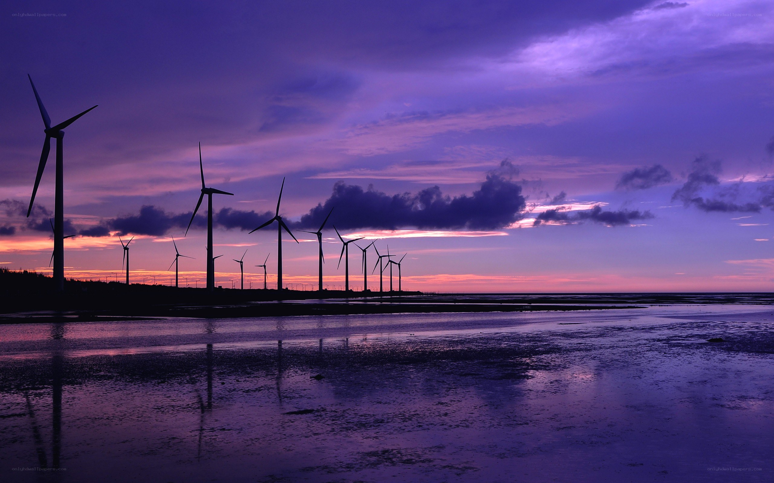 Wind turbines at sunset