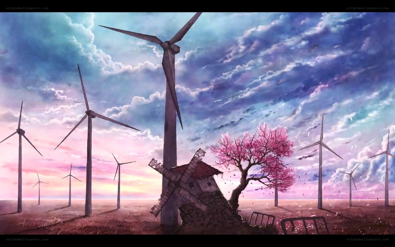 Wind turbines at sunset