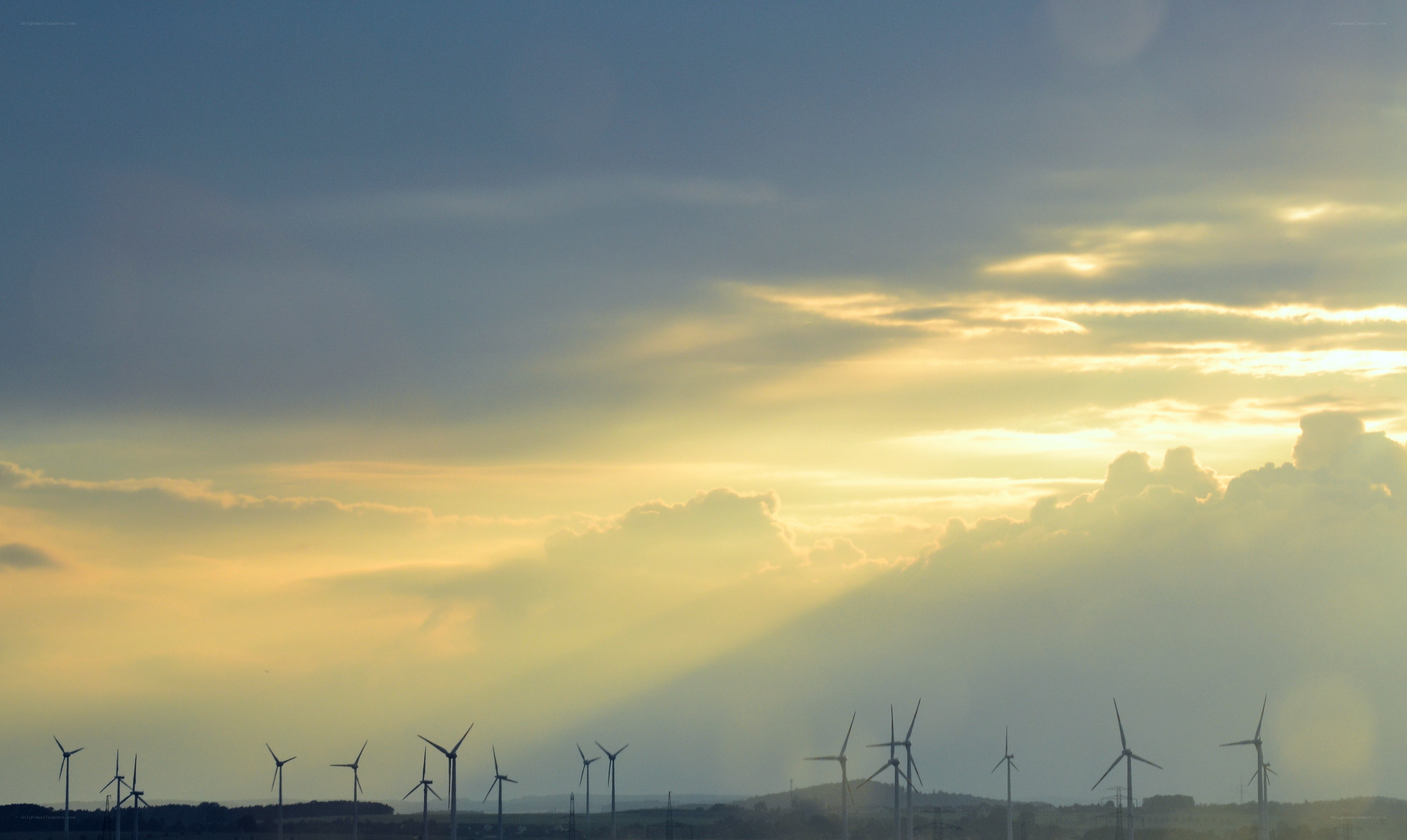 Wind turbines at sunset
