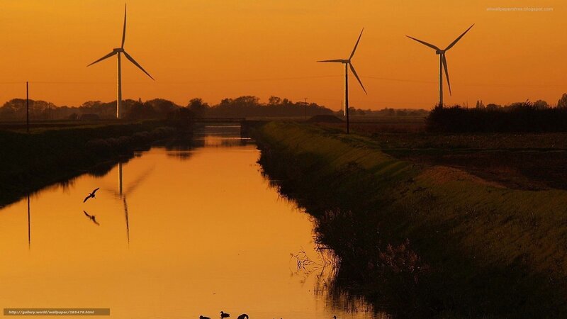 Wind turbines at sunset