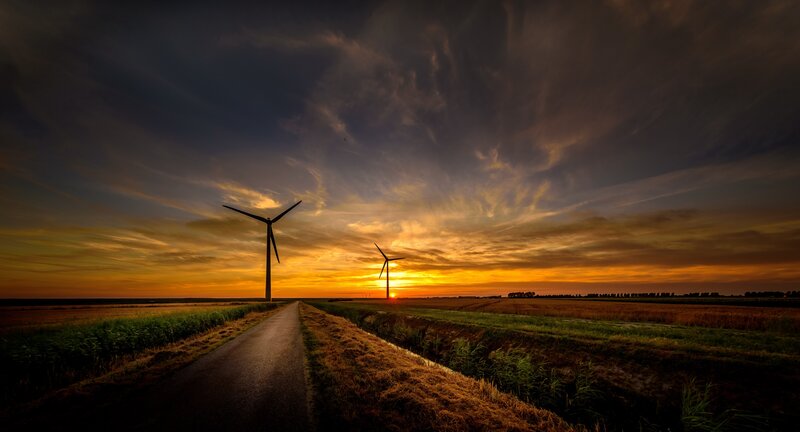 Wind Turbines at Sunset — Orange, Dramatic, Photograph, Road