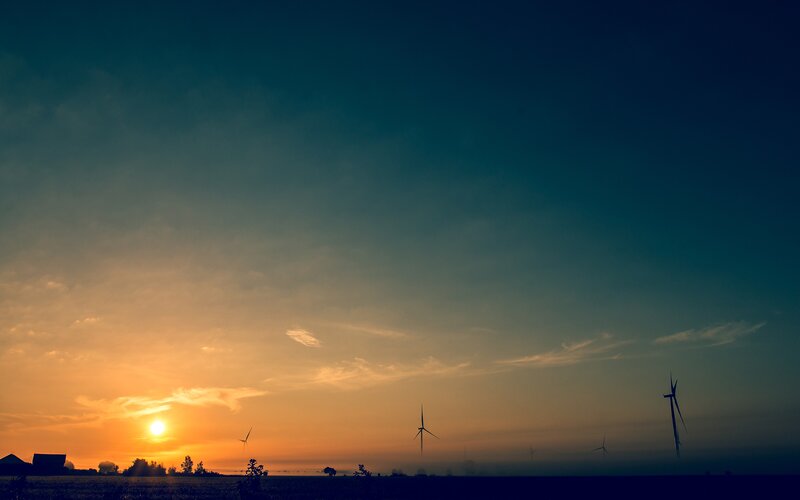 Wind Turbines at Sunset — Orange, Serene, Photograph, Field, Clouds