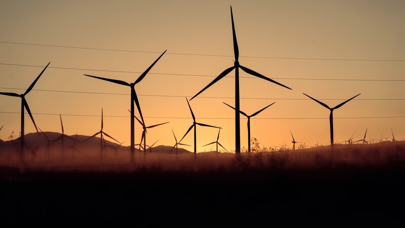 Wind Turbines at Sunset — Orange, Serene, Photograph, Mountains