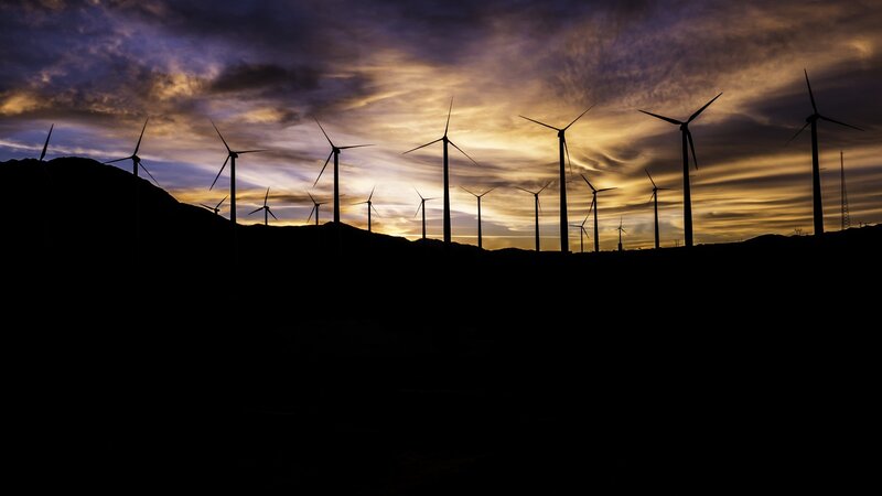 Wind Turbines at Sunset — Purple, Dramatic, Photograph, Clouds, Hills