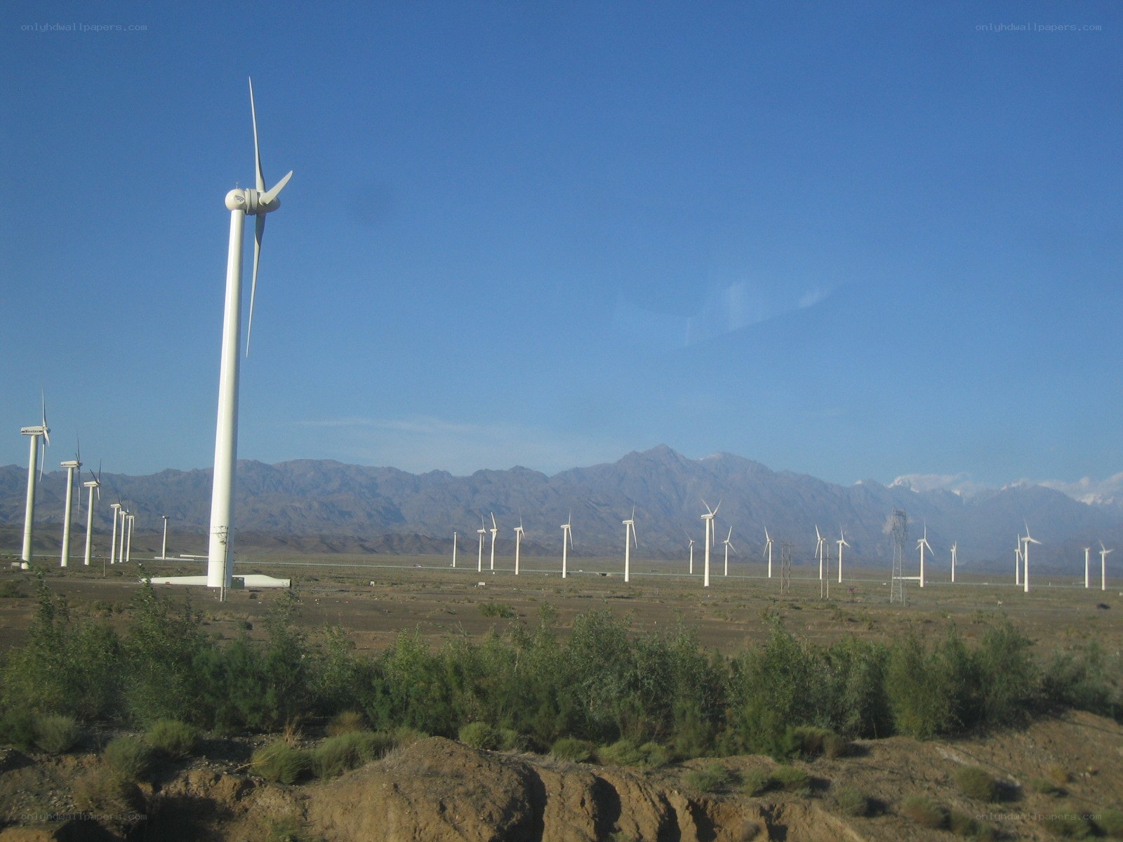 Wind turbines in a desert landscape