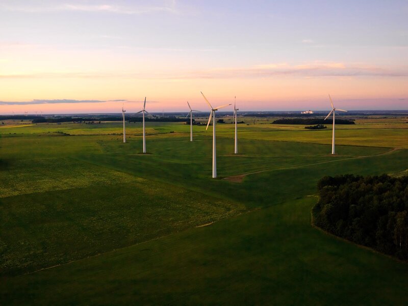 Wind turbines in a green field