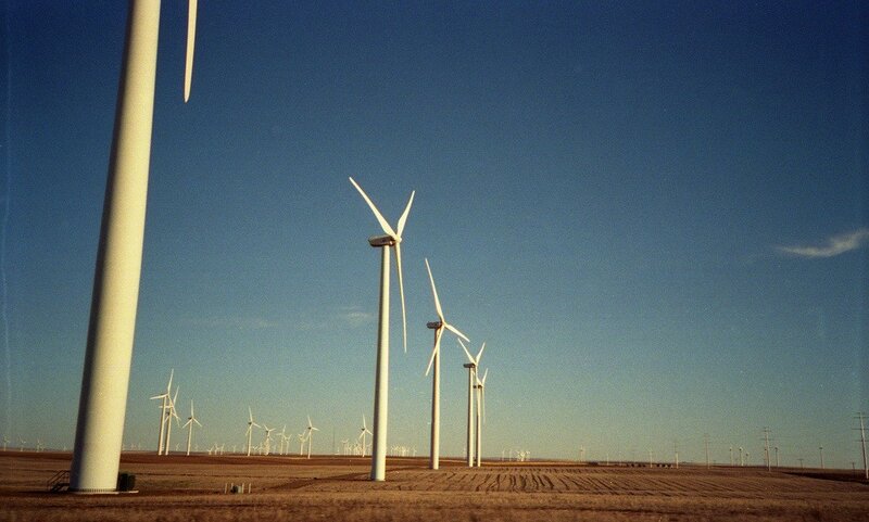 Wind Turbines in Field — Blue, Serene, Afternoon, Photograph, Sky