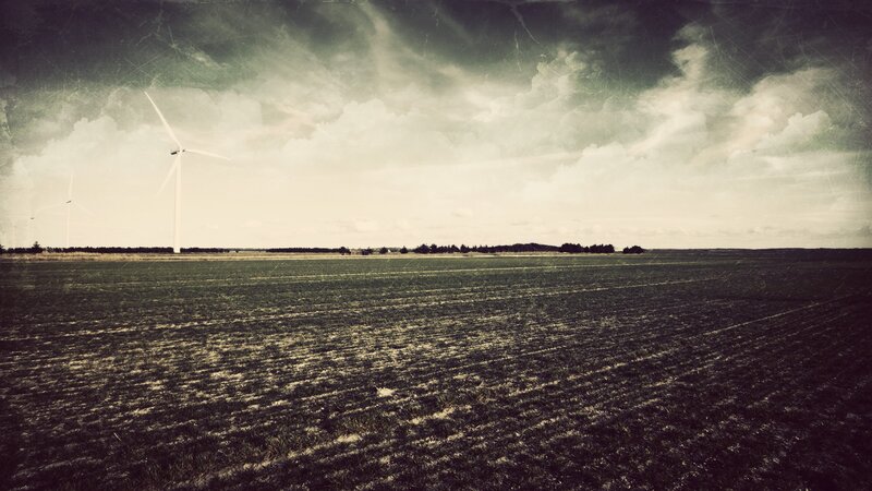 Wind Turbines in Field — Green, Dramatic, Afternoon, Photograph, Clouds, Trees