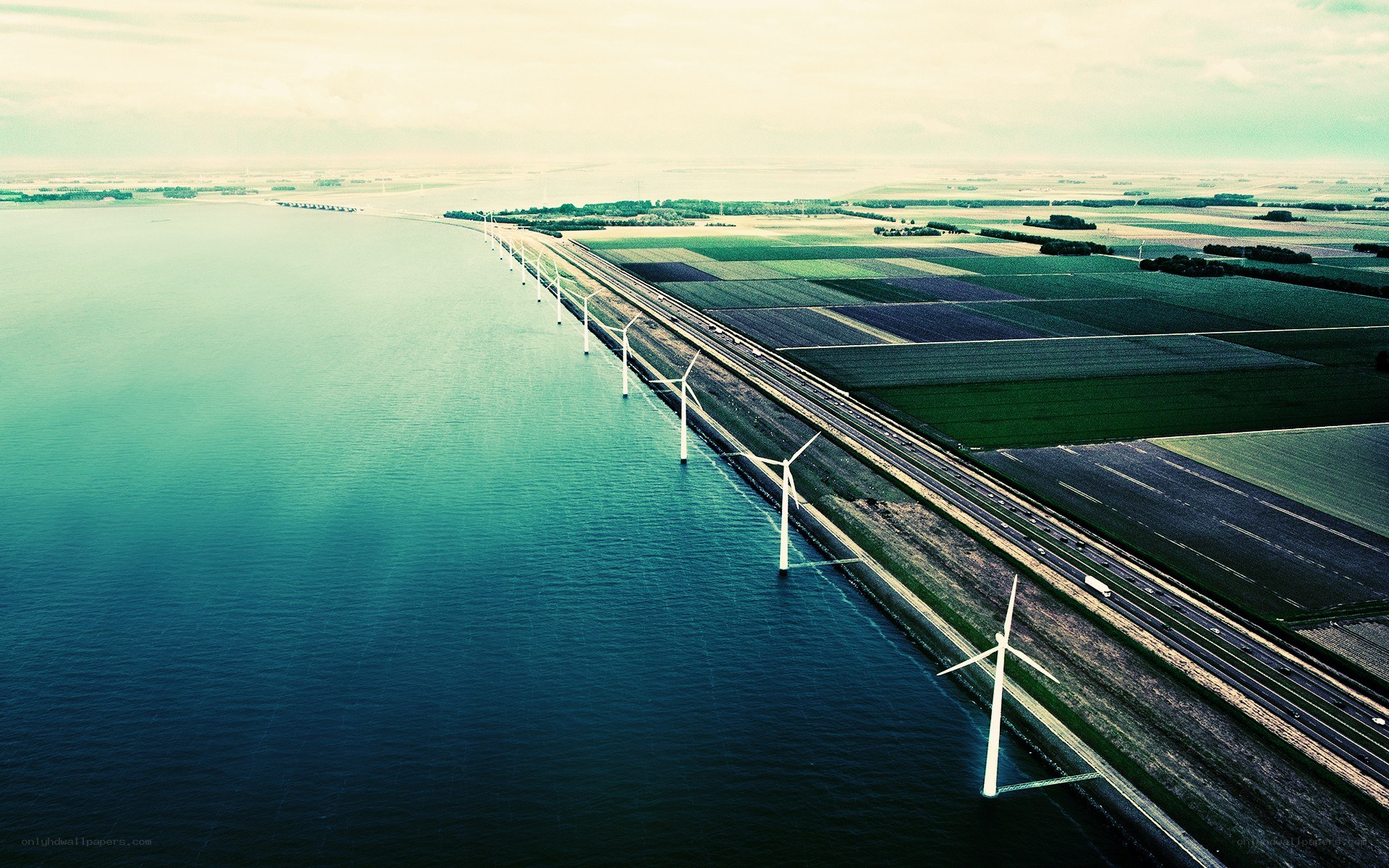 Wind turbines on a coastal bridge