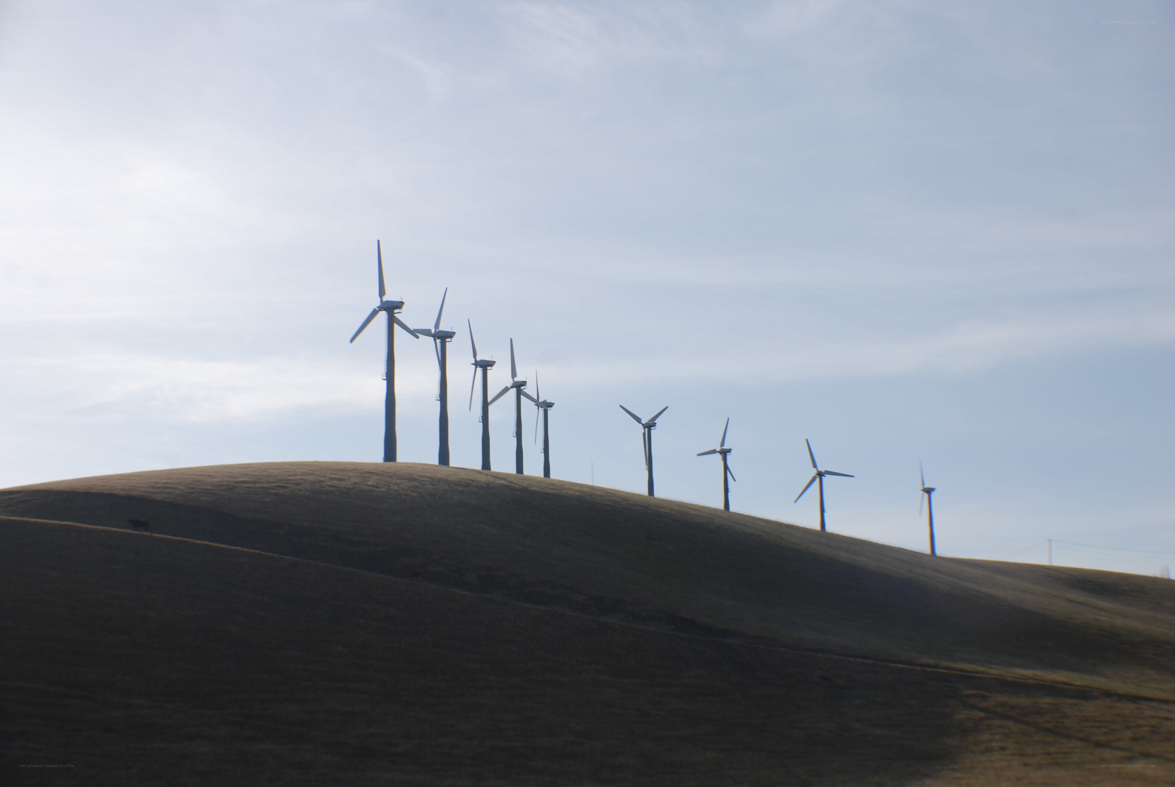 wind turbines on a hill