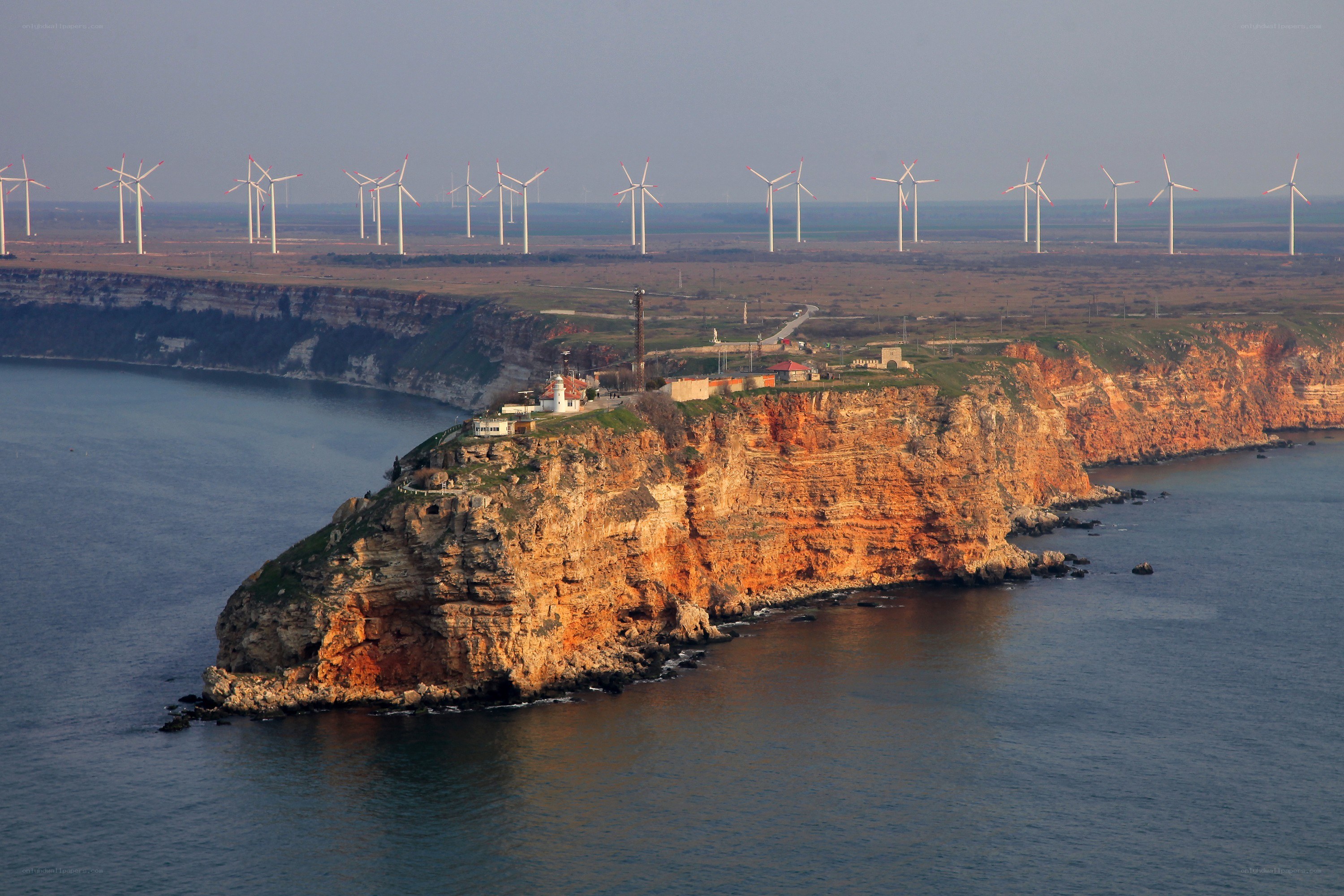 Wind turbines on coastal cliffs