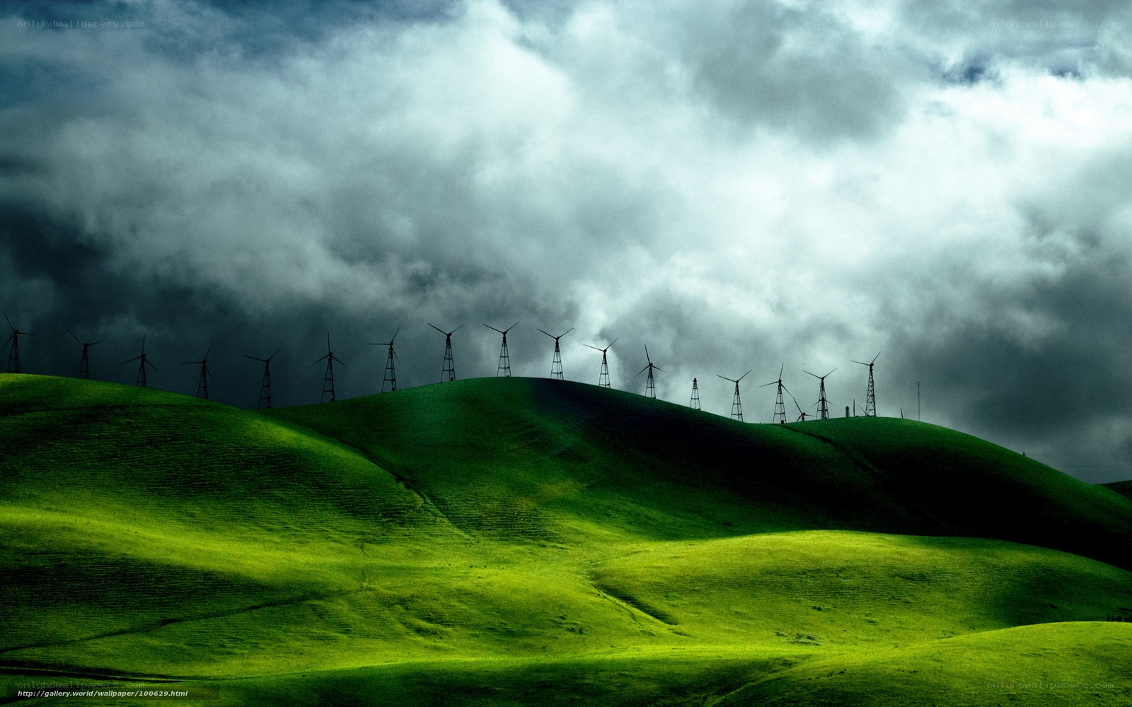 Wind turbines on green hills